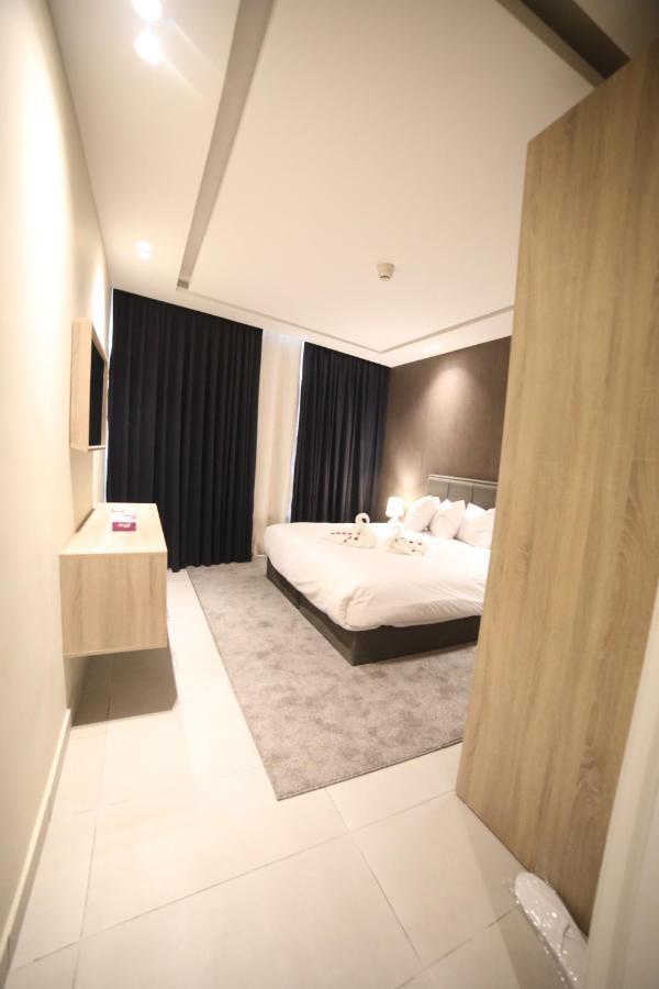 فندق صحارى الخليج Sahara Gulf Hotel Apartments Amman Bagian luar foto