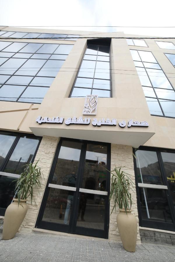 فندق صحارى الخليج Sahara Gulf Hotel Apartments Amman Bagian luar foto