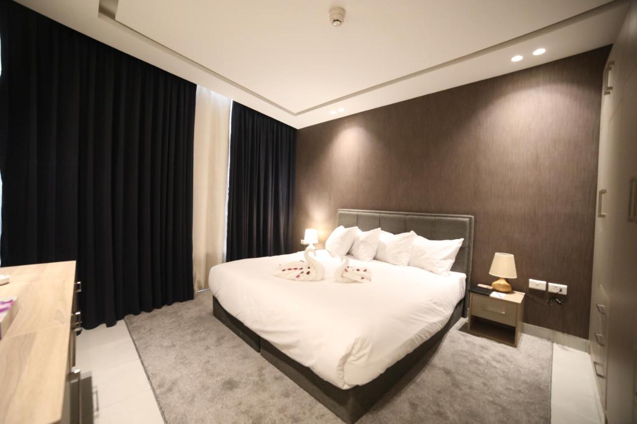 فندق صحارى الخليج Sahara Gulf Hotel Apartments Amman Bagian luar foto